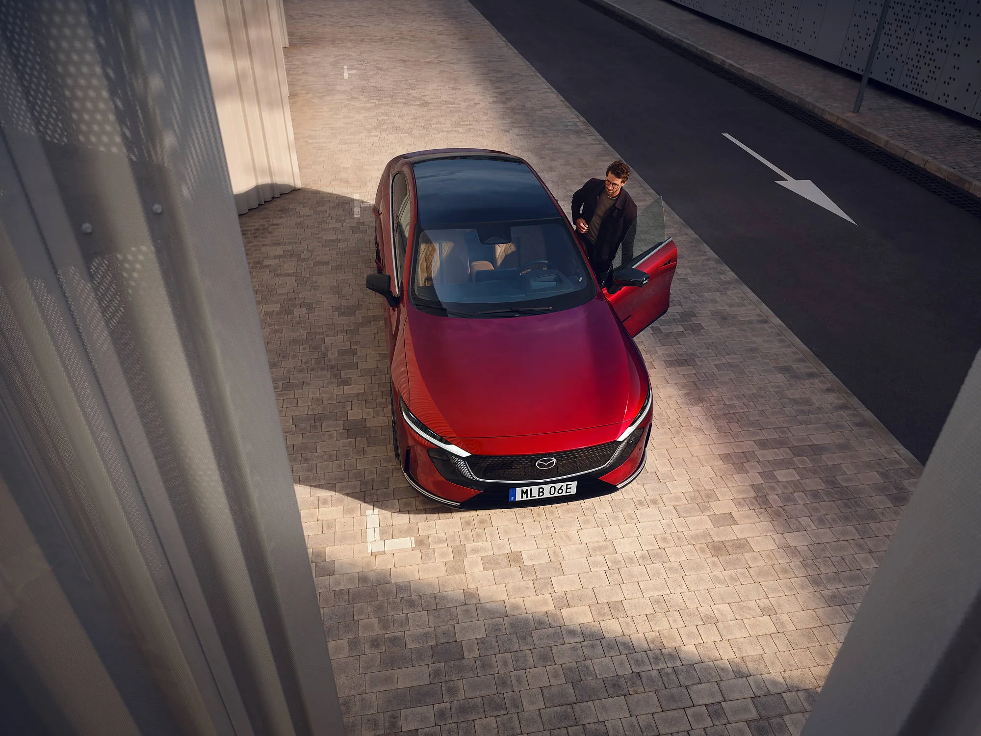 2025_Mazda6e_GER-LHD_C011_EXT_Front_FromAbove_SoulRedCrystal_INT_TANLeather_High+_withTalent_until_Mar12th2030_RGB_SWEnull